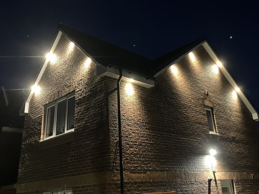 Soffit downlights on a semi-detached home