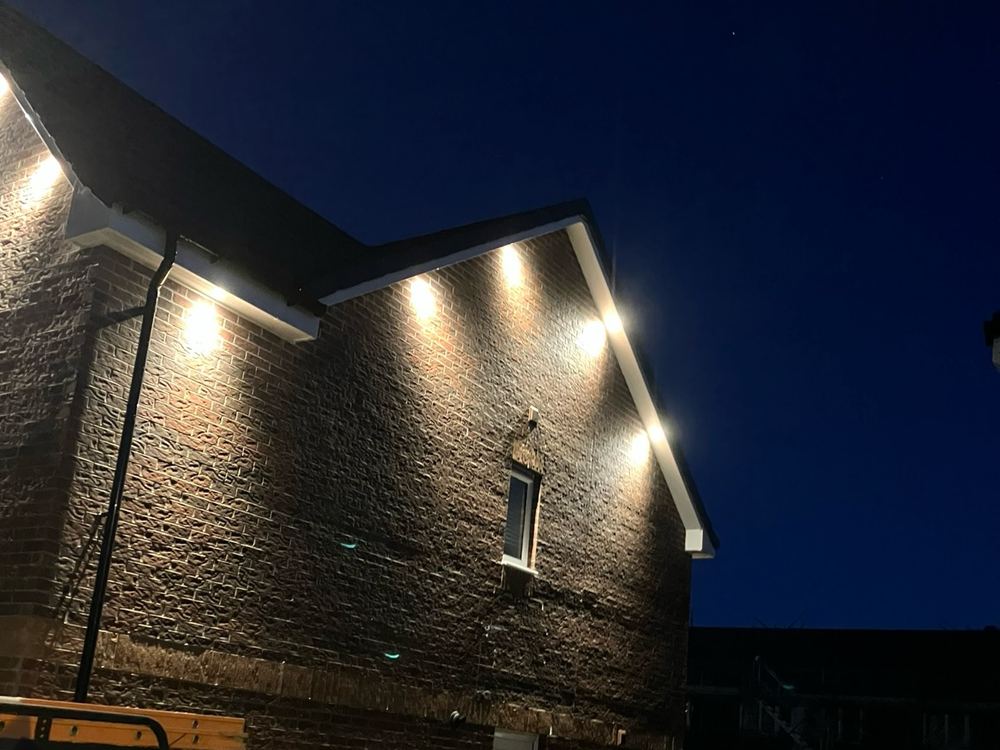 Soffit lighting along the side of a house